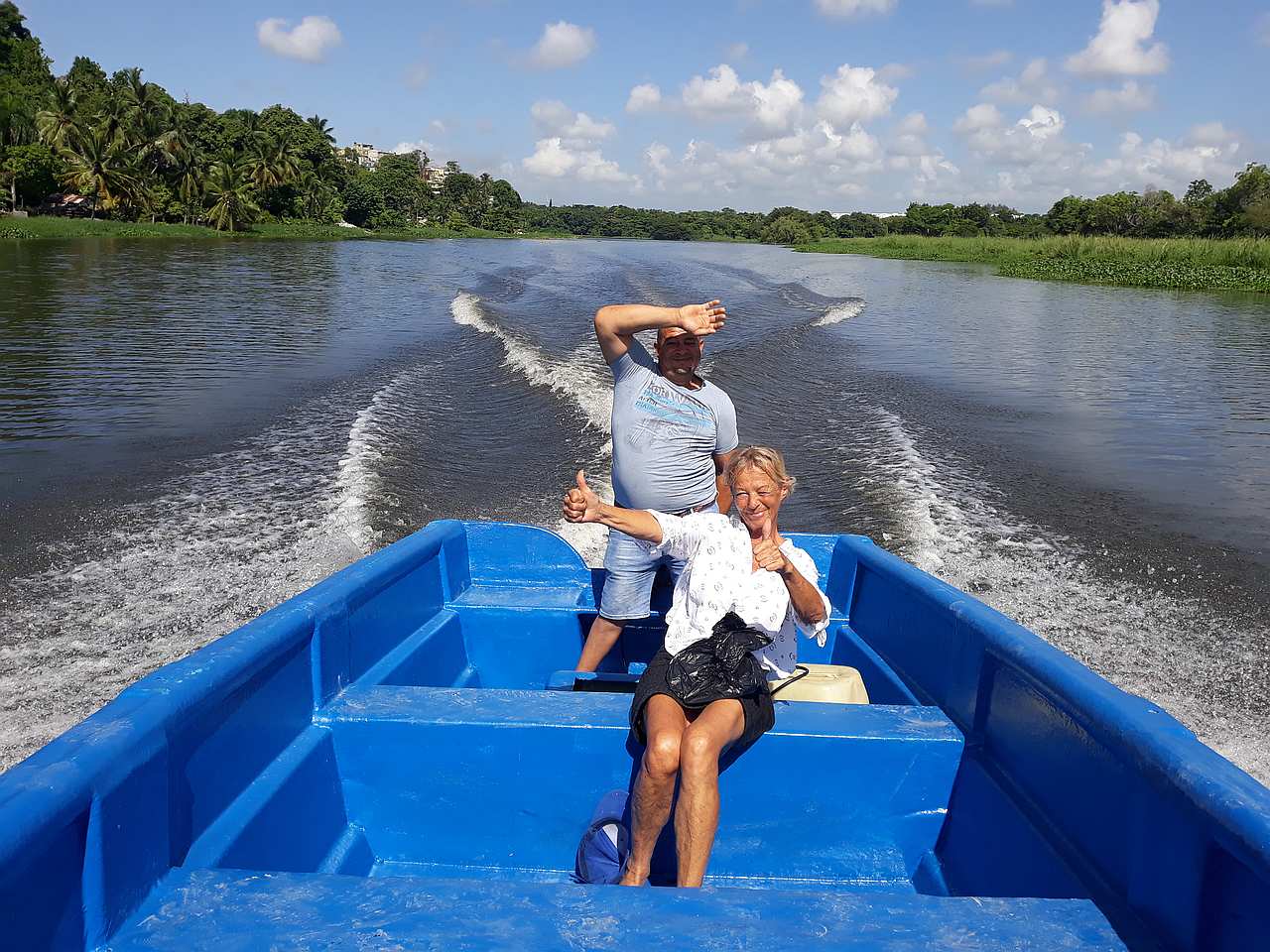 Happy tourists on a boat ride in Santo Domingo
