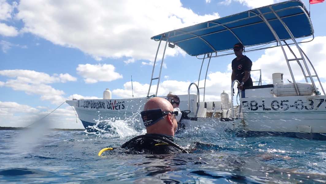 boat and diver in Caribbean Sea